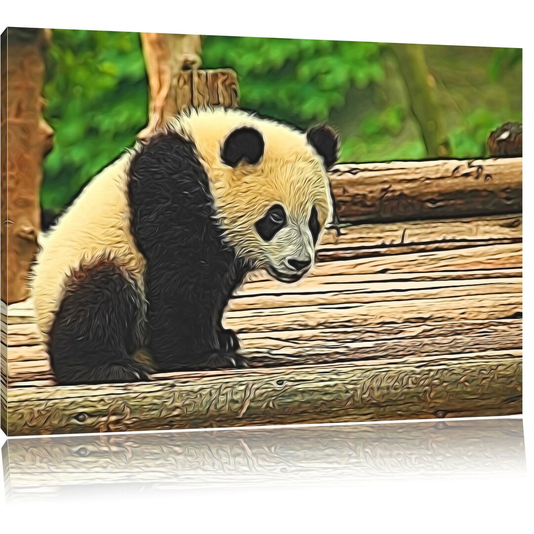 Leinwandbild Panda auf Holzstämmen in Braun/Grün