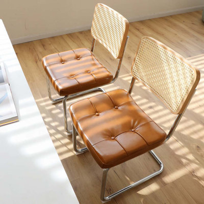Chaises de salle à manger en rotin avec pieds chromés
