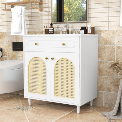Meuble-lavabo élégant avec façade en rotin tissé, lavabo en céramique, tiroir basculant et tablette réglable