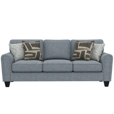 Soft Blue Upholstered Sofa with Pillows