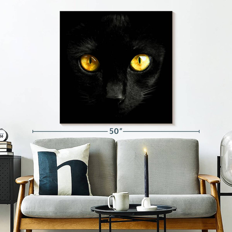 Chat noir aux yeux jaunes Brampt, H 33 po x l 33 po