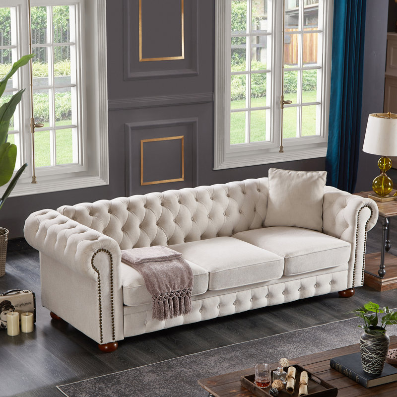 Canapé Chesterfield en tissu beige