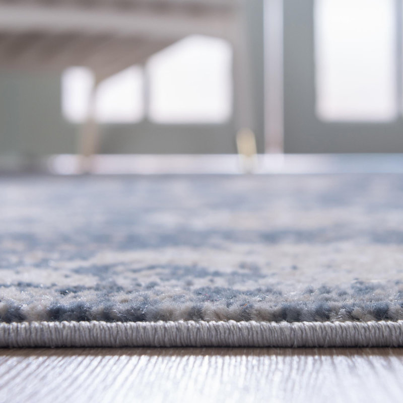 Tapis ivoire Dimarco, Marine, Ovale 3 pi 3 po x 5 pi 3 po