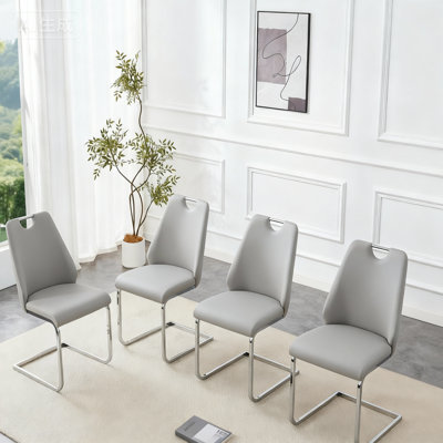Ensemble de 4 chaises de salle à manger rembourrées modernes avec revêtement en similicuir, haut dossier
