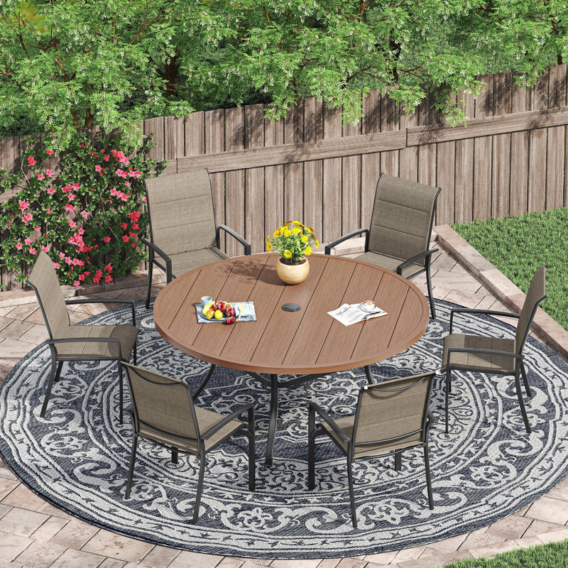 Ensemble de salle à manger de patio avec table de salle à manger ronde 47,2 po et 6 chaises rembourrées en textilène