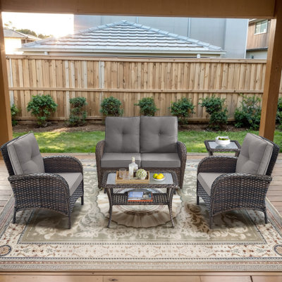 Gaetanino 7-Pieces Outdoor Conversation Set with Glider Loveseat and Cushions
