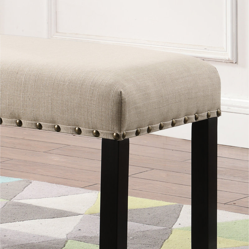 Dining Bench In Tan With Touch. Linen And Cotton Upholstered Seat. Hardwood Legs. 44"W X 16.5"D 19"H. Some Assembly Is Imperative & Upholstery Trim. Solid Partial Unmistakably Required