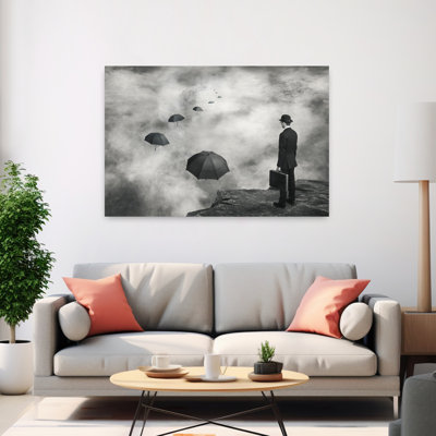 Homme et parapluies flottants