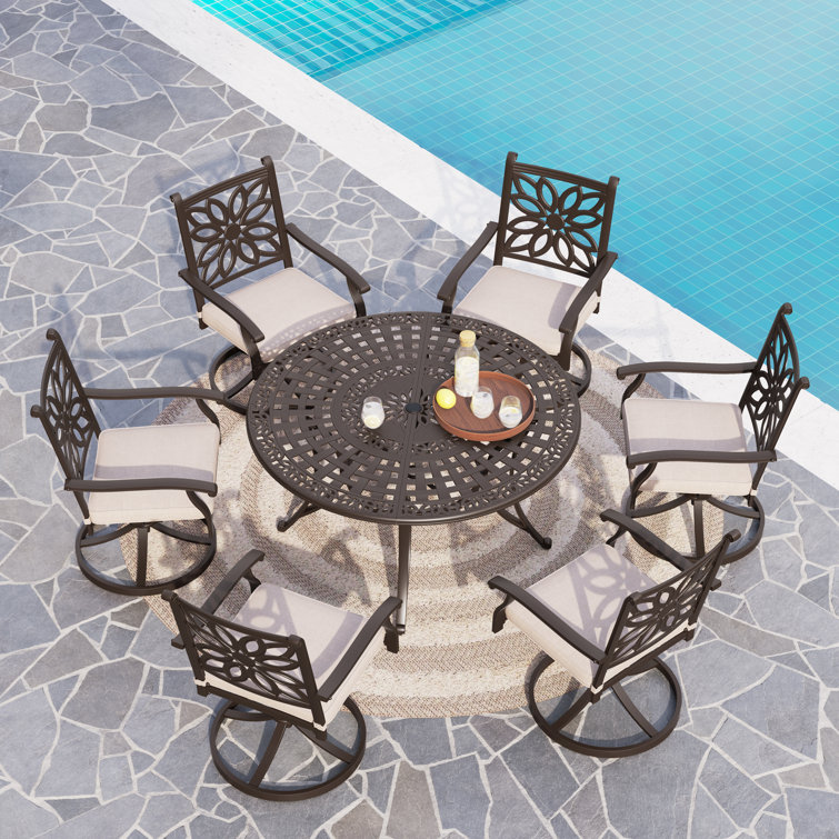 Asfand Round 6 - Person 53.9" Long Dining Set with Cushions