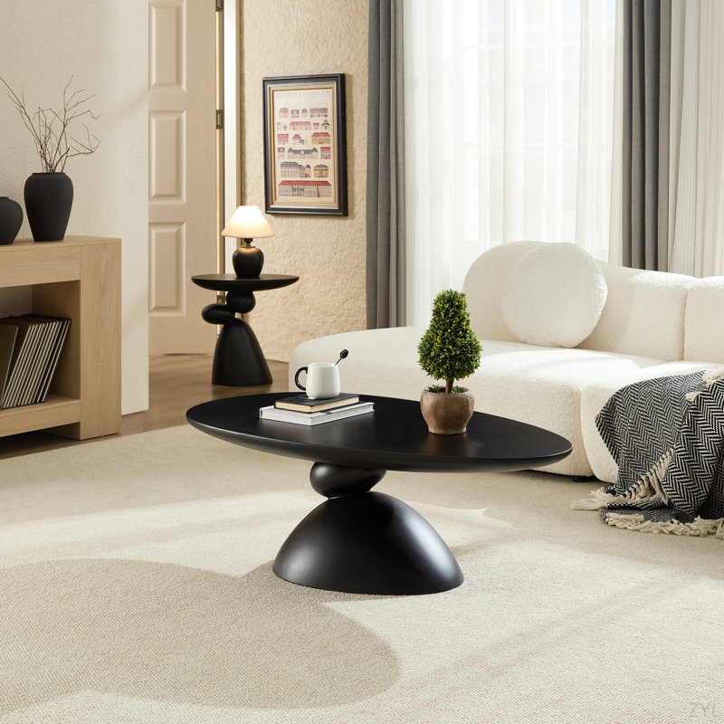 Table basse 47,27 "ovale en pierre, moderne et minimaliste en fibre de verre avec base de table sculpturale pour salon, Noir