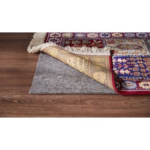 https://assets.wfcdn.com/im/36902759/resize-h310-w310%5Ecompr-r85/5170/51703026/bergen-dual-surface-030-thick-indoor-rug-pad.jpg