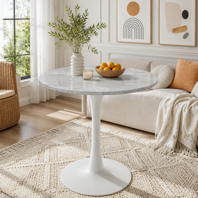 Table basse ronde avec plateau en marbre