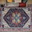 Tapis bleu / rouge en laine noué à la main-124927848