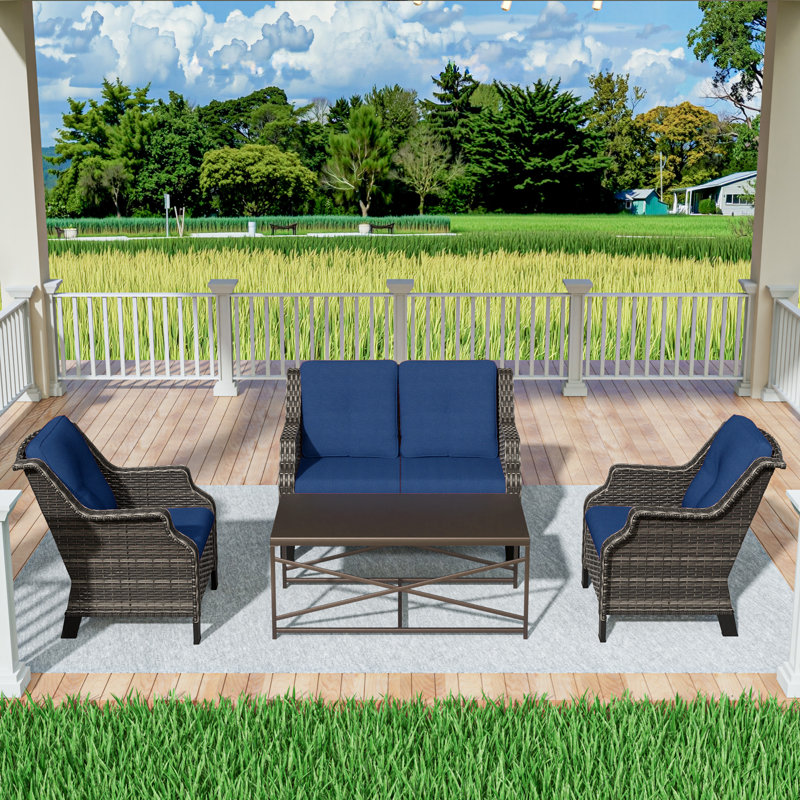 4 Pieces All-Weather Wicker Patio Conversation Set With Cushions, Loveseat, 2 Chairs & Metal Coffee Table, Blue