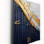 Une horloge murale moderne «A Touch Of Gold And Kings Blue IV»-99637653