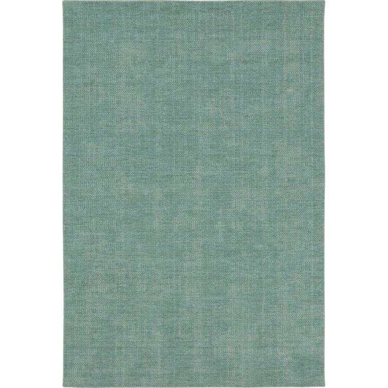 Tapis bleu en laine tissé à la main