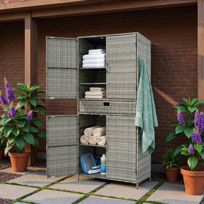 Grande armoire de rangement extérieure en osier avec un grand tiroir, des tablettes réglables et des pieds de support réglables en hauteur