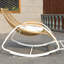 Chaise berçante simple en rotin
