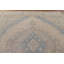 Tapis traditionnel en laine vieilli