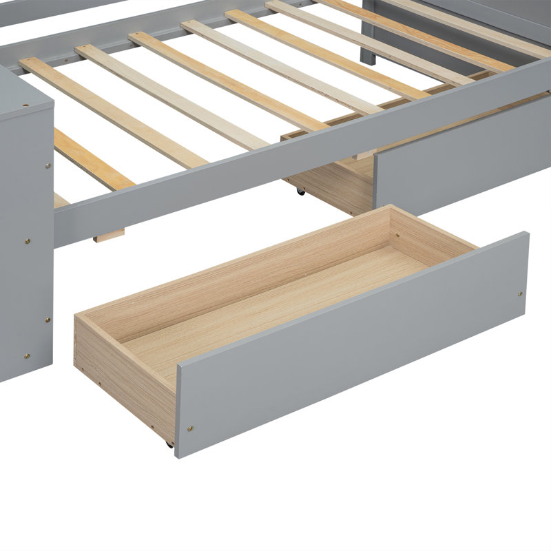 Lit de jour pratique avec tablettes et tiroirs pour un repos confortable et un rangement efficace dans divers espaces de vie