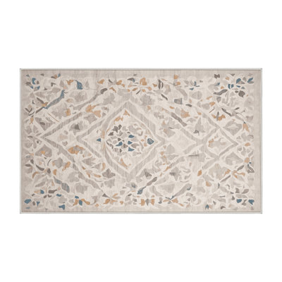Tapis beige lavable à la machine
