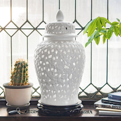 Stoneware Ceramic Jar with Intricate Cutout Design and Removable Lid