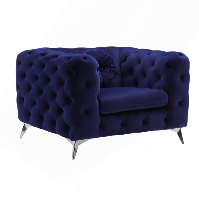 Fauteuil en velours bleu