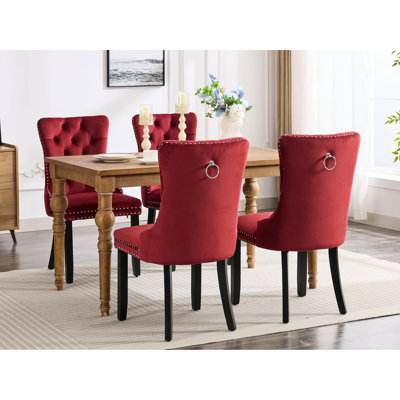 Chaises de salle à manger en velours bourgogne, de style luxueux, rivets décoratifs, fabrication en bois massif, sièges confortables 2 pièces bourgogne. Capitonnage contemporain, pieds robustes, éponge à rebond élevé,