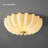 Beige Shell-shaped Ceiling Light With Gold Accent