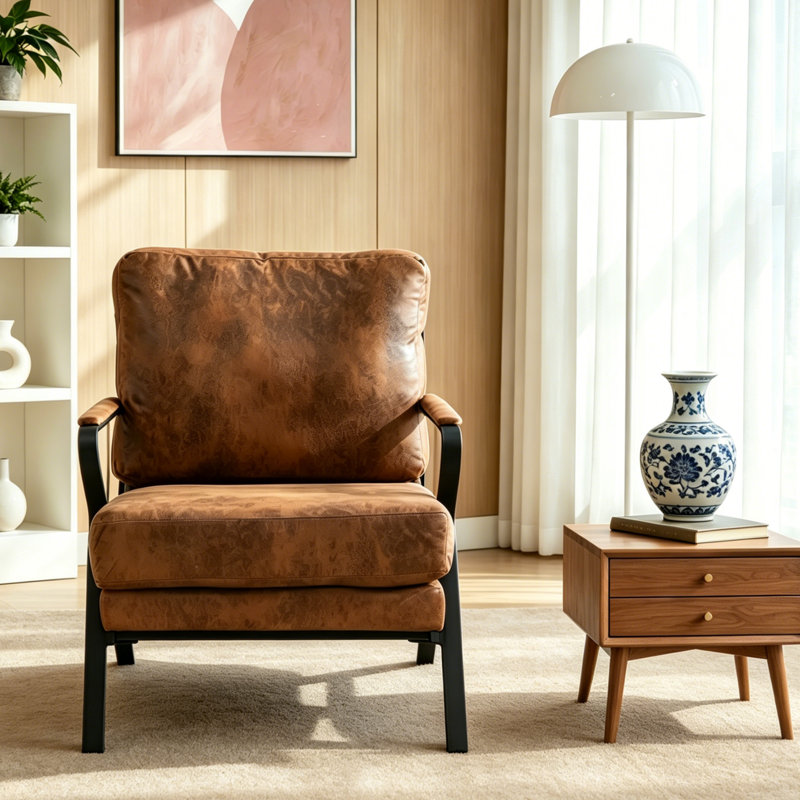 Dossier et accoudoirs courbés, ergonomiques et inclinés, associés à un tissu doux et à de la mousse haute densité pour une détente durable