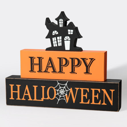 Happy Halloween sign with haunted house tabletop decor