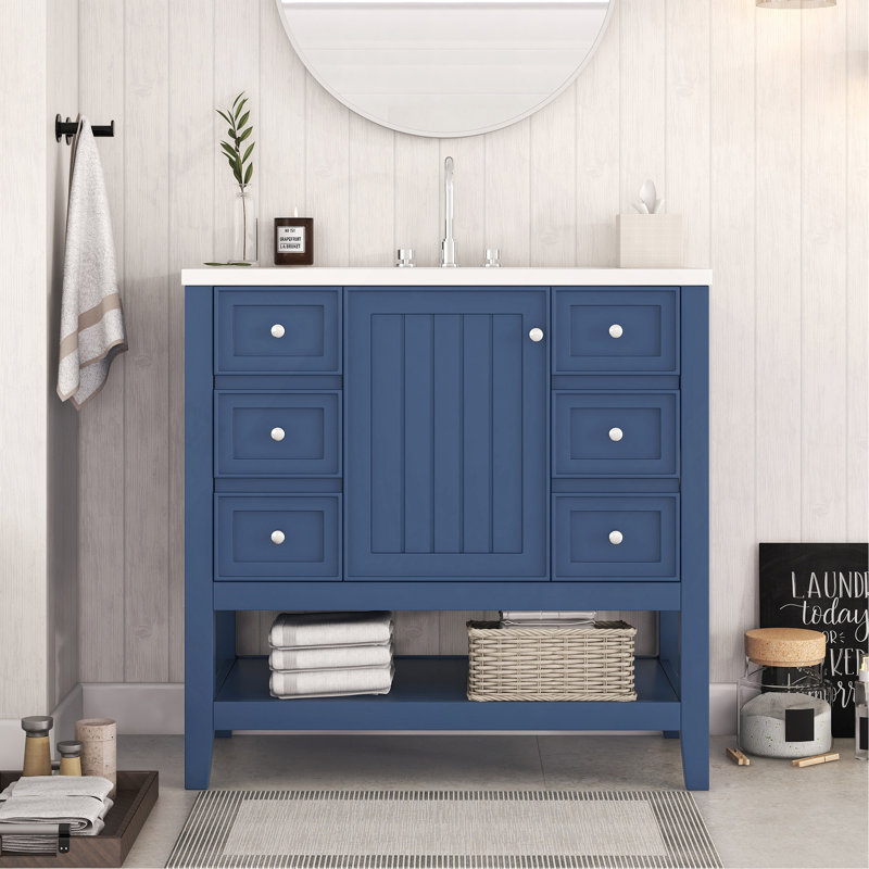 Meuble-lavabo élégant avec lavabo, tiroirs et armoire pour un décor de salle de bain fonctionnel et élégant., Bleu