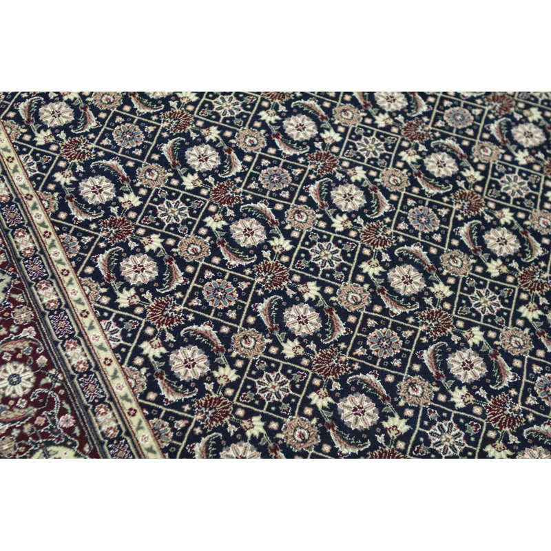 Tapis bleu marine et vin de haute qualité noué à la main