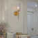 Bilbo Frame 1 Light Gold Arm Sconce With A Glass Shade