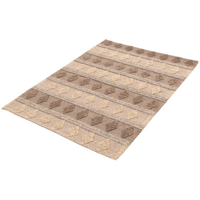 Tapis taupe en laine tressé à la main