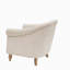 Fauteuil capitonné