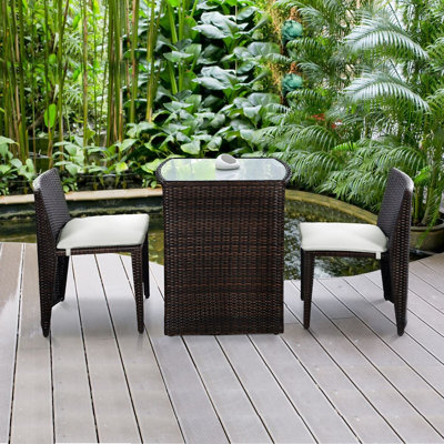 Ensemble de 3 chaises d'extérieur rembourrées en osier et table