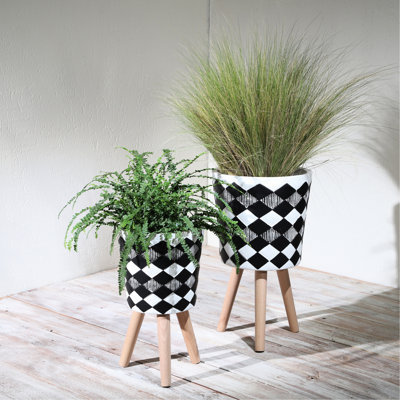 Pot de fleurs Black Diamond avec pieds en bois, 30 x 30 x 53 cm, idéal pour les plantes succulentes, les terrariums et les plantes d'intérieur. Un style élégant qui s'adapte à tous les espaces.
