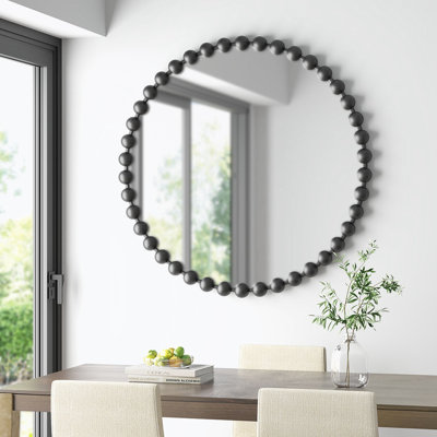 Miroir mural perlé de forme ronde avec cadre en métal