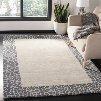 Candelo Animal Print Handmade Tufted Grey Area Rug