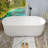 67'' x 29.5'' Freestanding Solid Surface Bathtub in Matte White