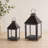 Set of Two Black Geometric Iron And Glass Floor Lantern Candle Holders