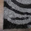 Tapis à poils longs en polyester touffeté à la main Akyrie-27439175