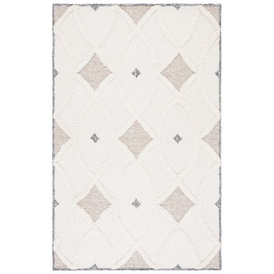 Dalontae Hand Tufted Wool/Cotton Geometric Rug in Brown/Ivory