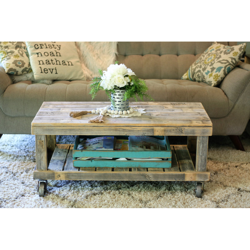 Table basse avec pieds en bois massif avec rangement Leos