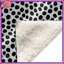 Couvertures à pois noirs et blancs-124116160