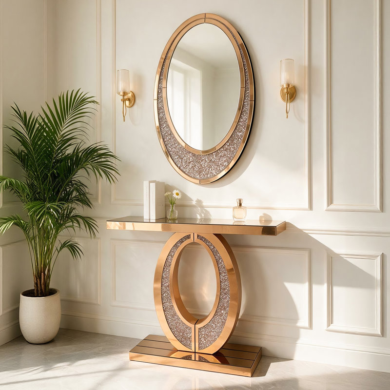 Console d'entrée dorée à miroir avec cadre ovale creux et incrustation de diamants concassés étincelants, table d'appoint décorative glamour pour hall d'entrée, salon ou vestibule.