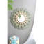 Miroir enchanteur à médaillon en fer forgé et charme floral