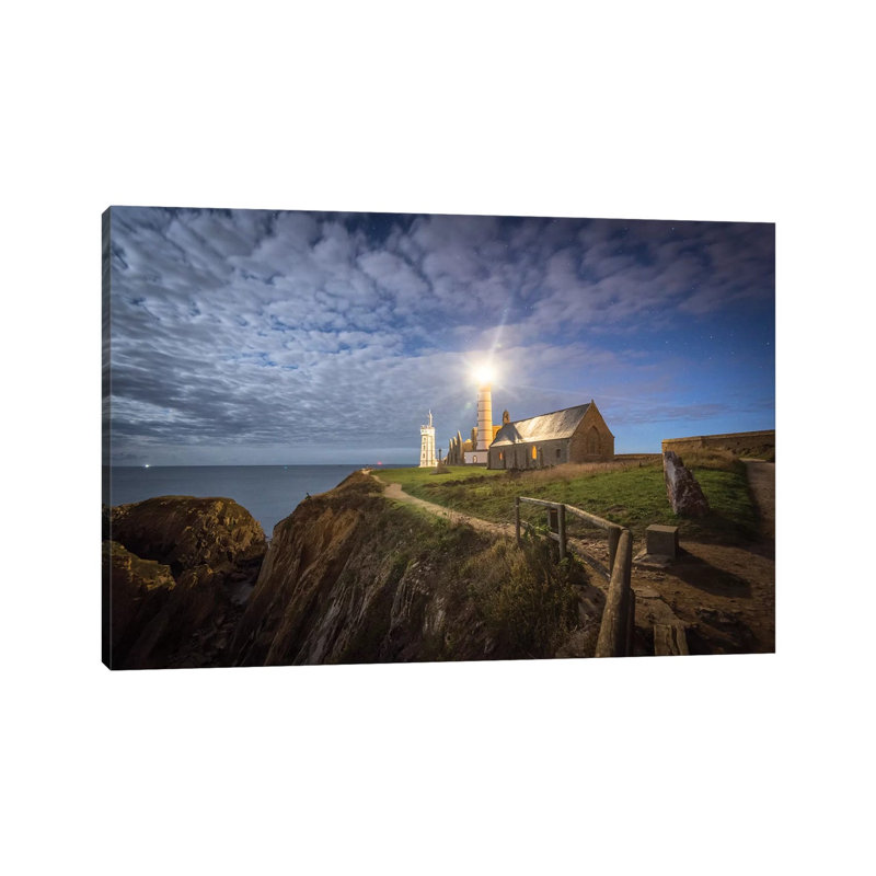 The Lighthouse Under The Sky by Philippe Manguin - Wrapped Canvas Print, 20.32 cm H x 30.48 cm W
