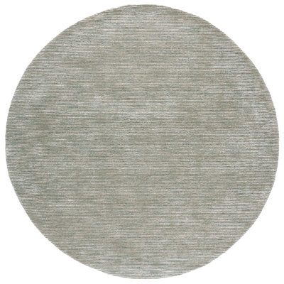 Akshada Hand Tufted Viscose/Wool Rug in Green